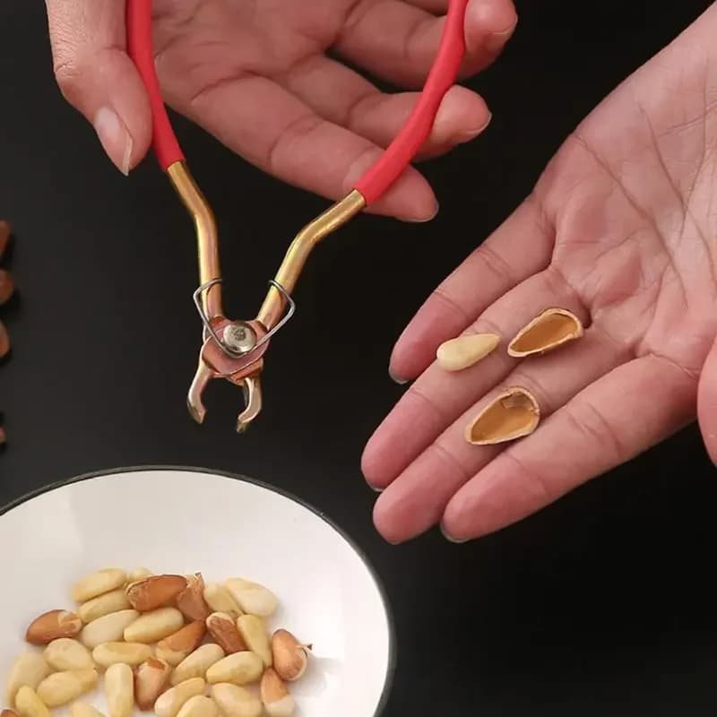 Pinze multifunzionali pinze per sbucciare pinze per noci Clip per frutta secca pinoli Clip maniglie rosse Hardware gadget da cucina