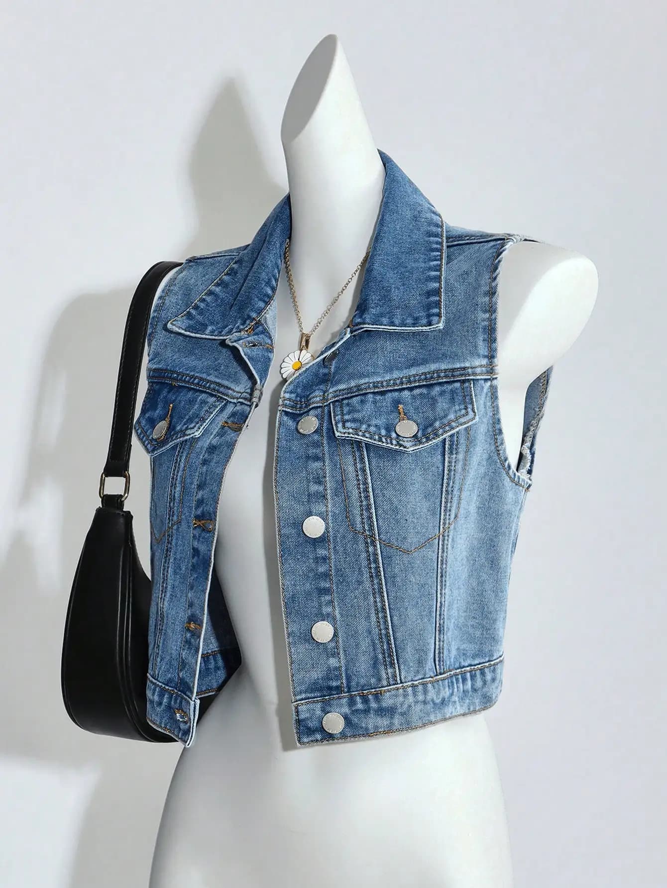 Gilet in denim senza maniche leggermente slavato da donna