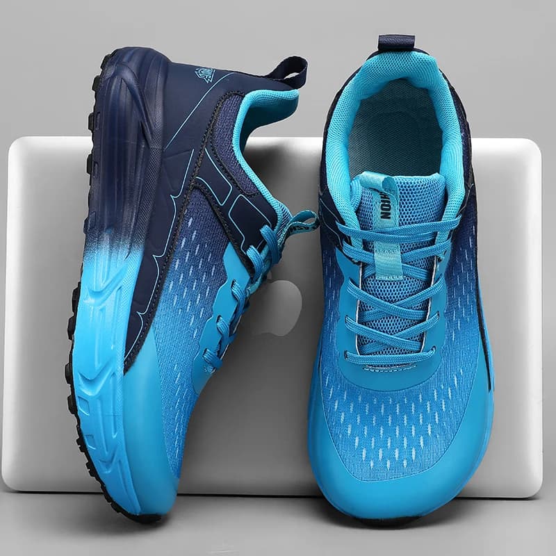 Sneakers with wide toe and sole with plateaus Fashionable casual sports shoes for men running on foot