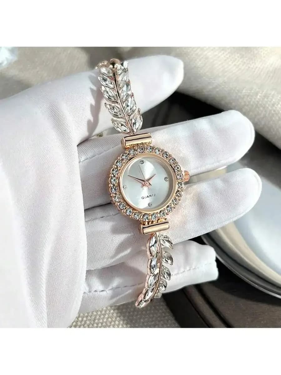Orologio da donna regolabile minimalista con quadrante rotondo con foglie in strass