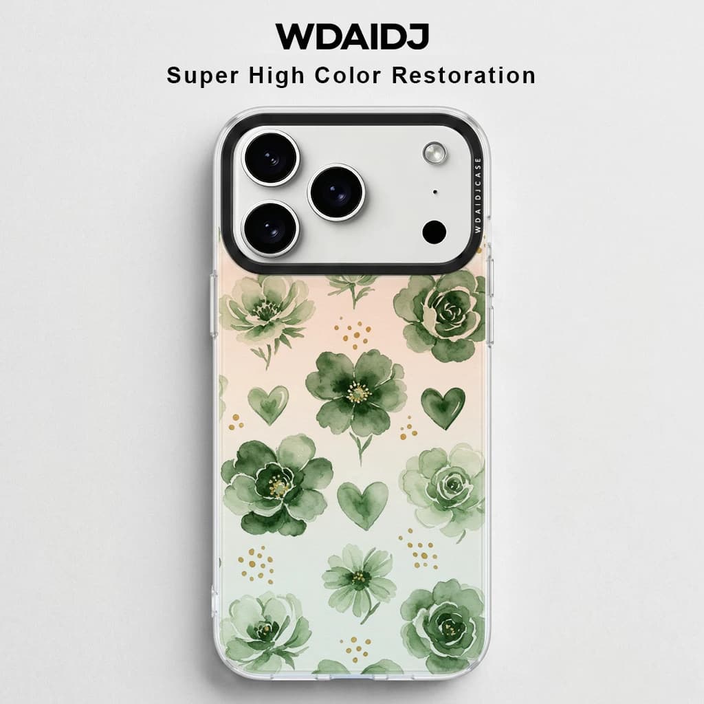 Custodia per iPhone 17 16 15 14 13 con stampa floreale verde delicata e cuori su sfondo rosa sfumato, cover trasparente botanica anti-caduta