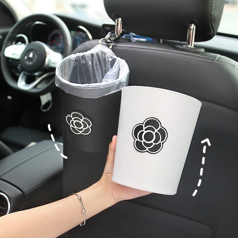 Simpatico cartone animato fiore bidone della spazzatura per auto per poggiatesta del sedile posteriore Mini presa d'aria automatica organizzatore sacchetto della spazzatura stoccaggio dei rifiuti