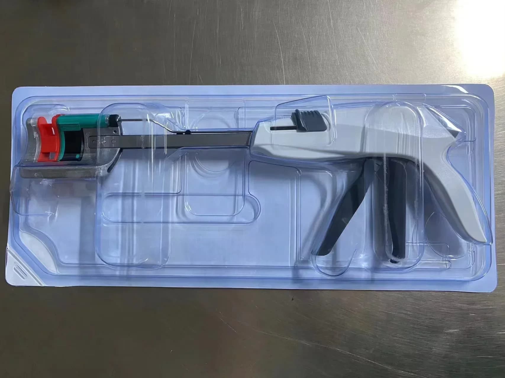 NUOVO IN MAGAZZINO Cucitrice monouso con taglierina curva per materiali di consumo medici di vendita caldi