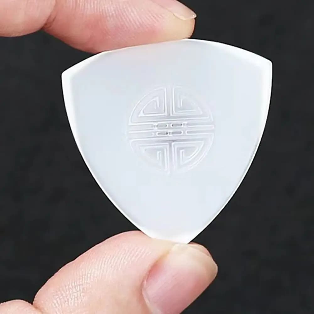 Plettri per chitarra Plettro per chitarra antiscivolo Nylon Universale Ruan Plettro Plettro Triangolo Prestazioni Ukulele Chitarra Protezioni per la punta delle dita