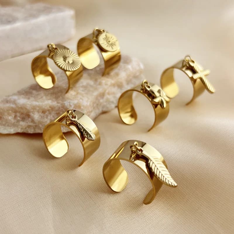Anello con ciondolo a forma di stella e piuma, stile misto di lusso leggero, in acciaio inossidabile europeo e americano per donna