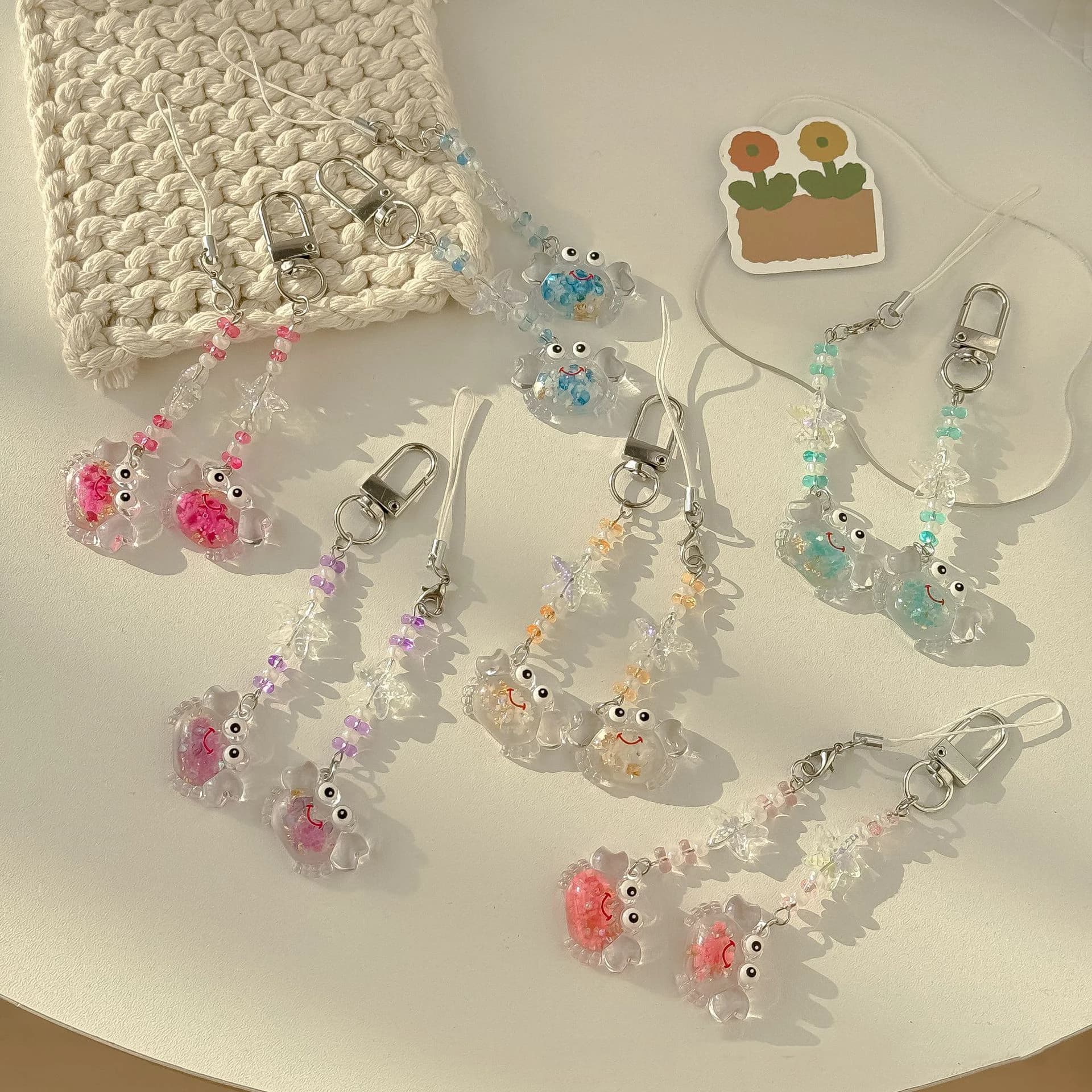 Nuovo simpatico colorato luce notturna granchio mobile pendente ghiaccio trasparente stella marina portachiavi accessori regalo all'ingrosso