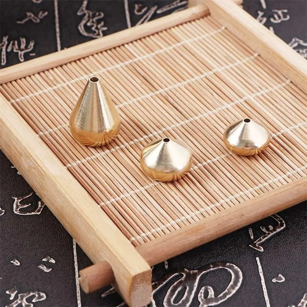 Aste artigianali in metallo portatili a forma di goccia d'acqua Base a spirale in legno di sandalo Porta bastoncini di incenso Decorazione domestica Base di incenso