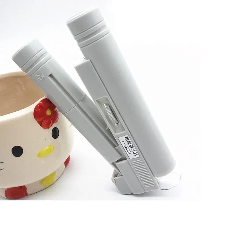 Mini microscopio tascabile 40X con luce a LED e scala di lettura Lente d'ingrandimento per illuminazione a LED Microscopio portatile portatile 1DIV/0,05 mm