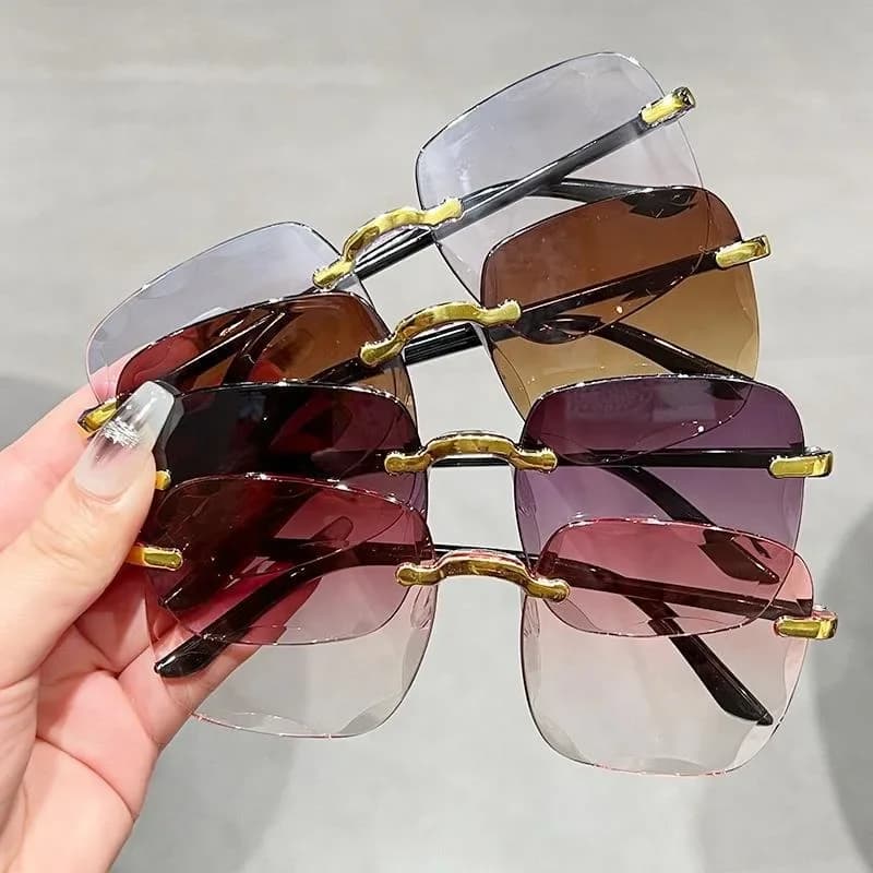 Occhiali da sole da donna di nuova tendenza, montatura grande e sottile senza bordi, per modellare il viso GGG