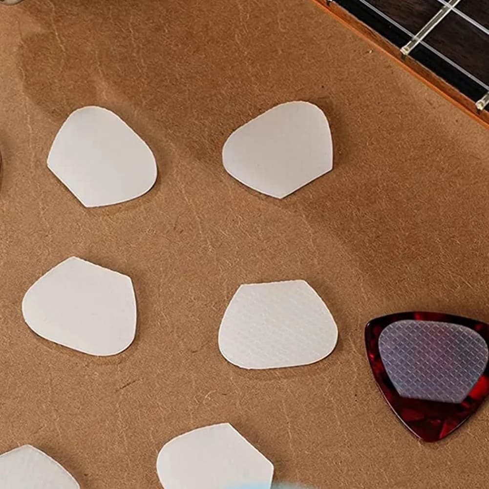 16 pezzi adesivi trasparenti antiscivolo per plettro per chitarra adesivi in silicone rinforzatori per palette accessori per plettro per chitarra [AA74-AAA]