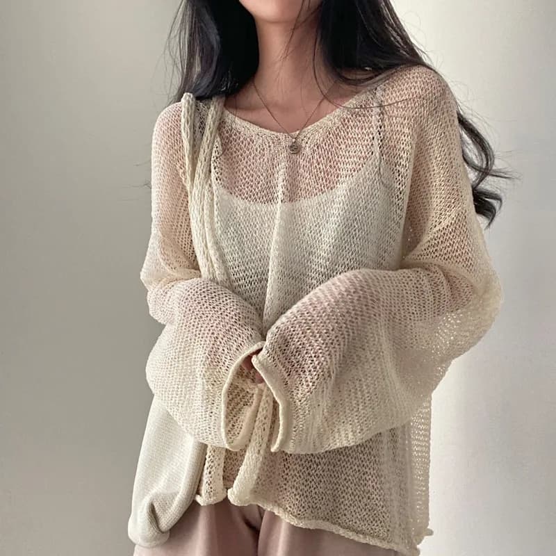 Pullover a maniche lunghe scavati sexy Moda donna Streetwear Maglia Autunno Primavera Maglioni trasparenti Abiti larghi per pendolari casual