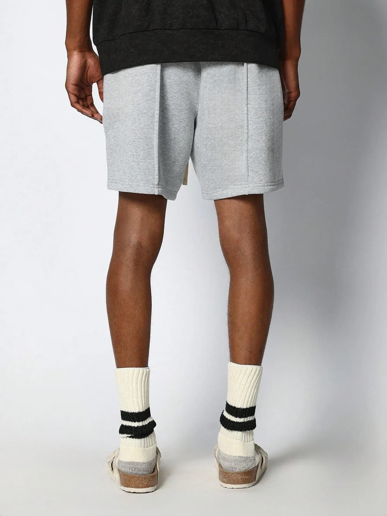 Pantaloncini plissettati con cavallo basso da uomo