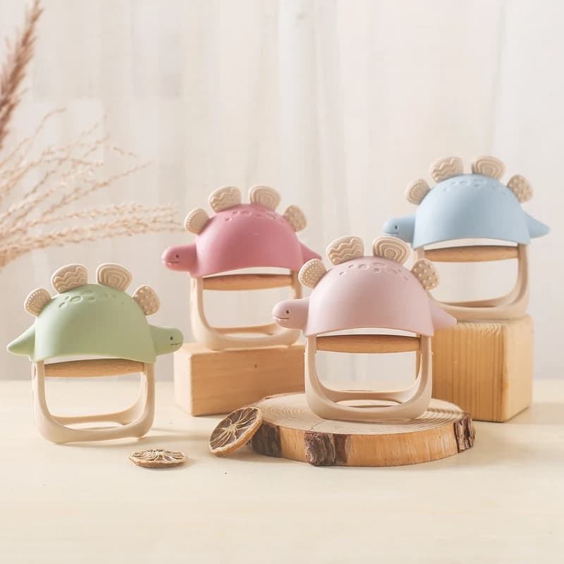 Giocattoli per massaggiagengive guanti per dinosauri massaggiagengive impugnatura per allenamento neonato in Silicone BPA Free Food Grade Baby giocattolo per dentizione Anti-morso regalo