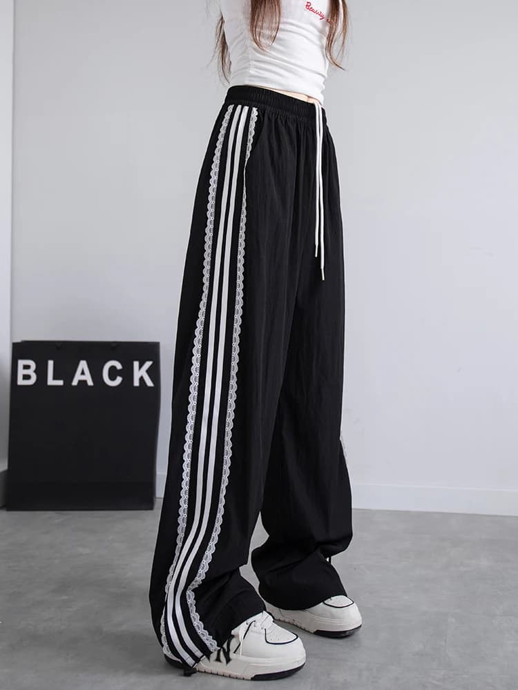 Pantaloni da donna coreani con patchwork in pizzo, pantaloni a gamba larga con strisce laterali, pantaloni sportivi casual, pantaloni da donna di tendenza 2026