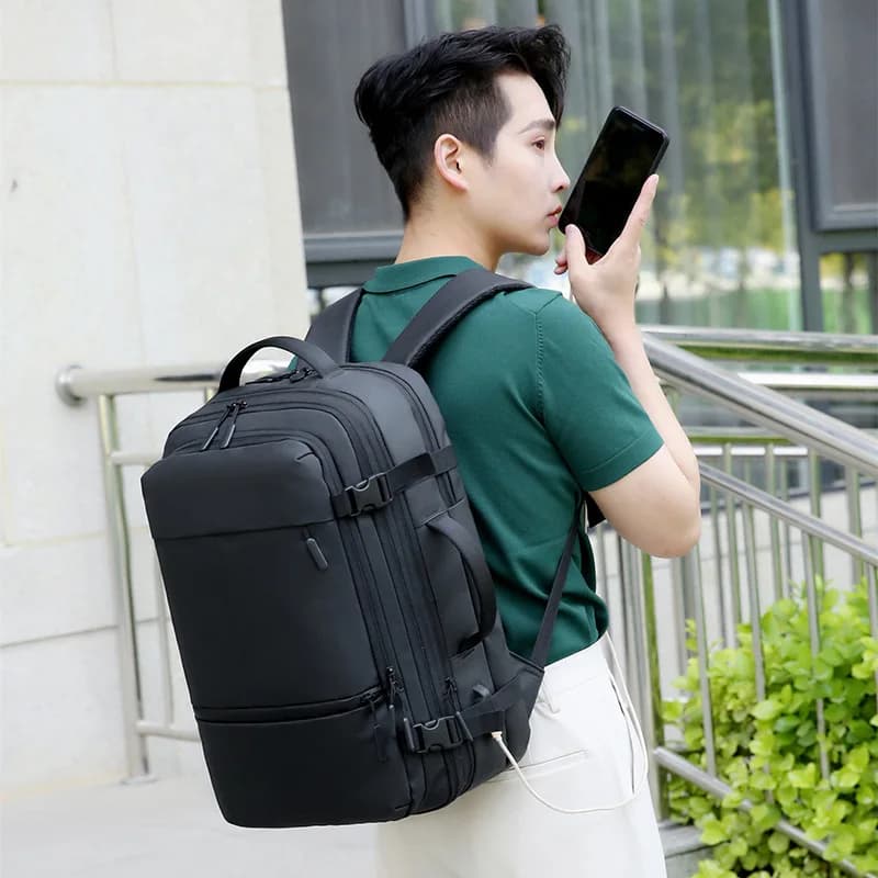 Adaptable expandable pack designed to fit large devices ideal for multi day trips and work travel