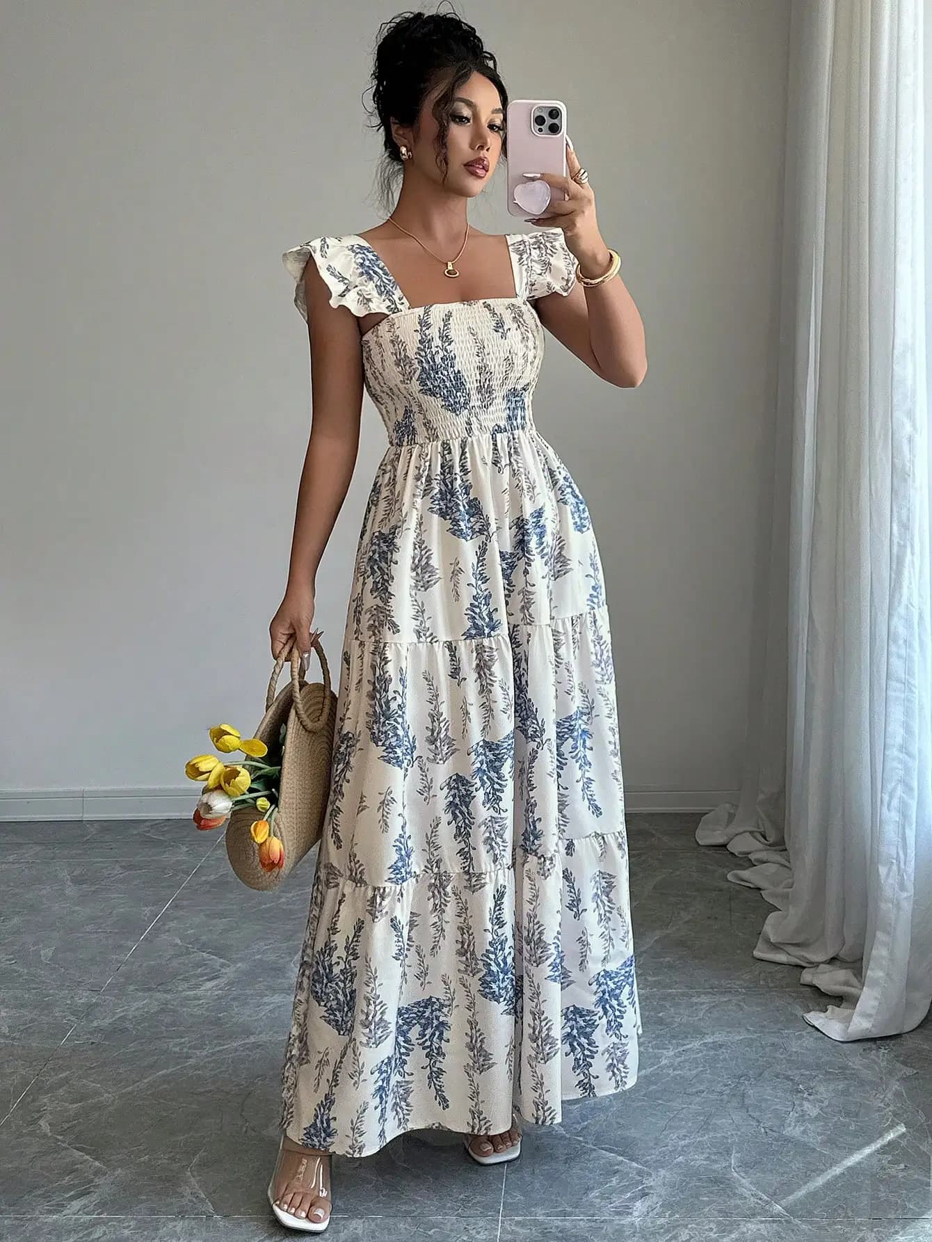 Elegant Blue Floral Print Tiered Maxi Dress with Ruffle Cap Sleeves and Smocked Waist