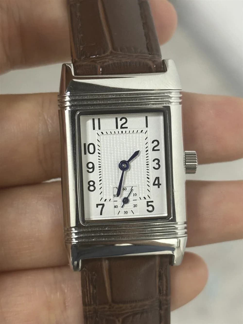 Men's and women's luxury wristwatch, quartz, with stainless steel and leather strap, sapphire dial.