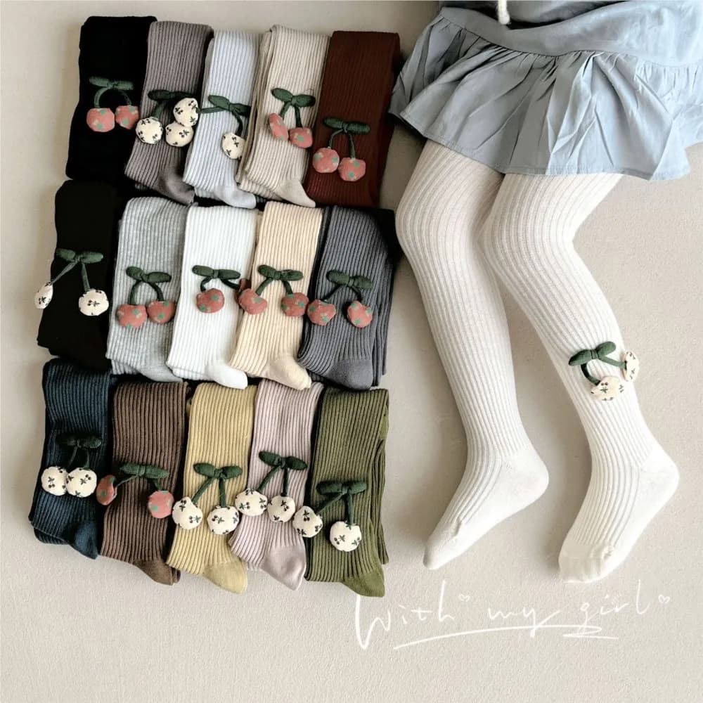 Leggings da ragazza in primavera e autunno indossano all'esterno e indossano graziosi leggings per bambini nella nuova tuta Mori color caramello.