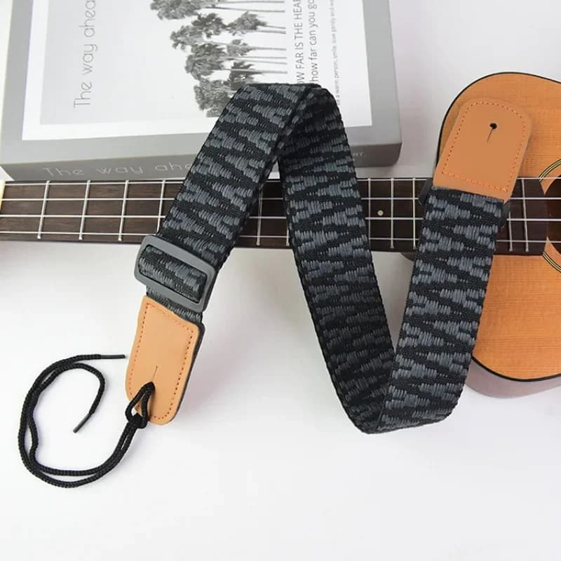 1PC Imbracatura per Ukulele Cintura per chitarra principale Cintura regolabile in tessuto ricamato con estremità in pelle per chitarra acustica elettrica basso
