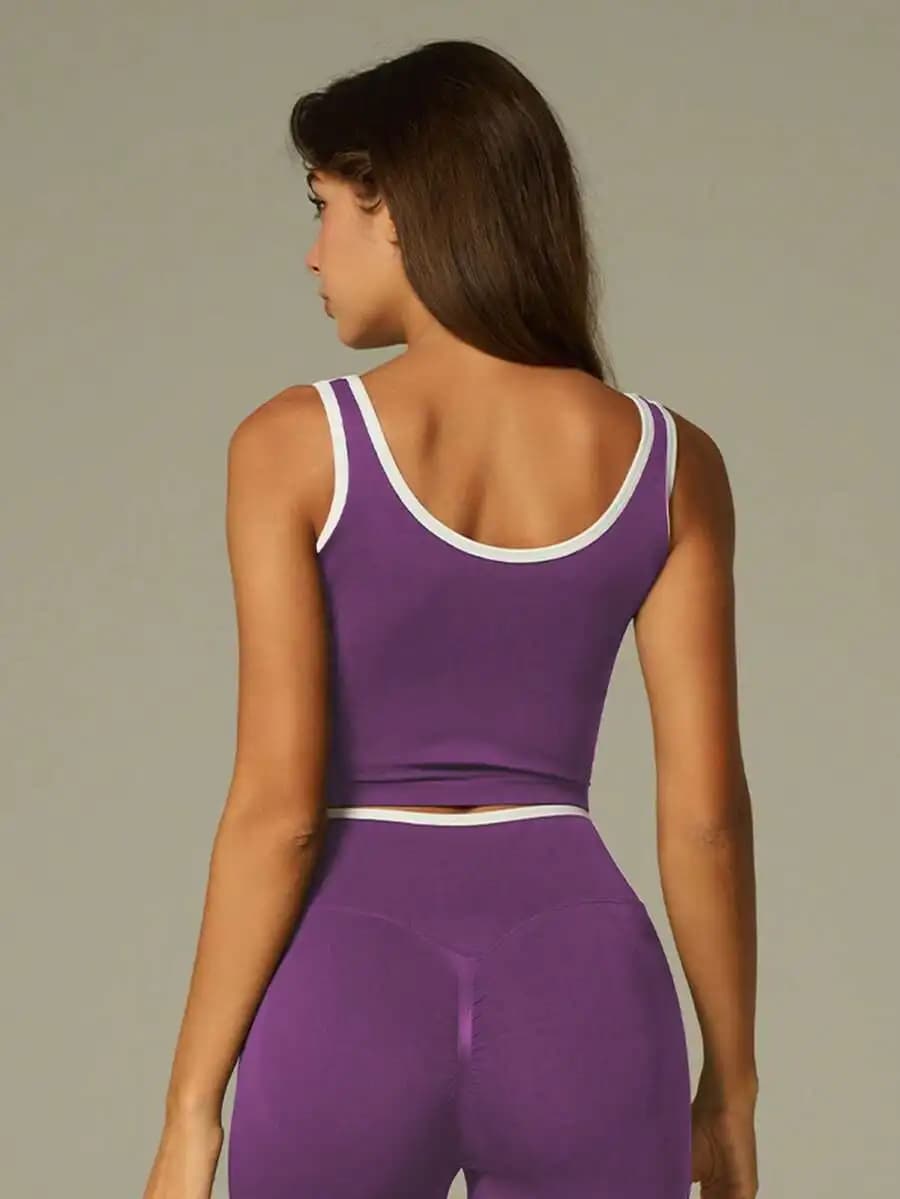 Set di abbigliamento sportivo senza cuciture viola da donna, top senza maniche e leggings