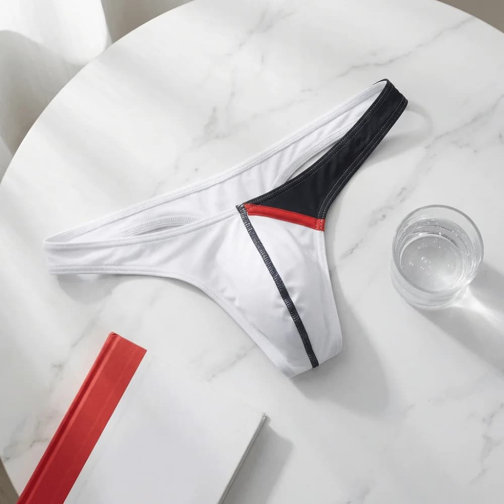 Slip a triangolo da uomo creativi patchwork, sottili, a vita bassa, con taglio a T