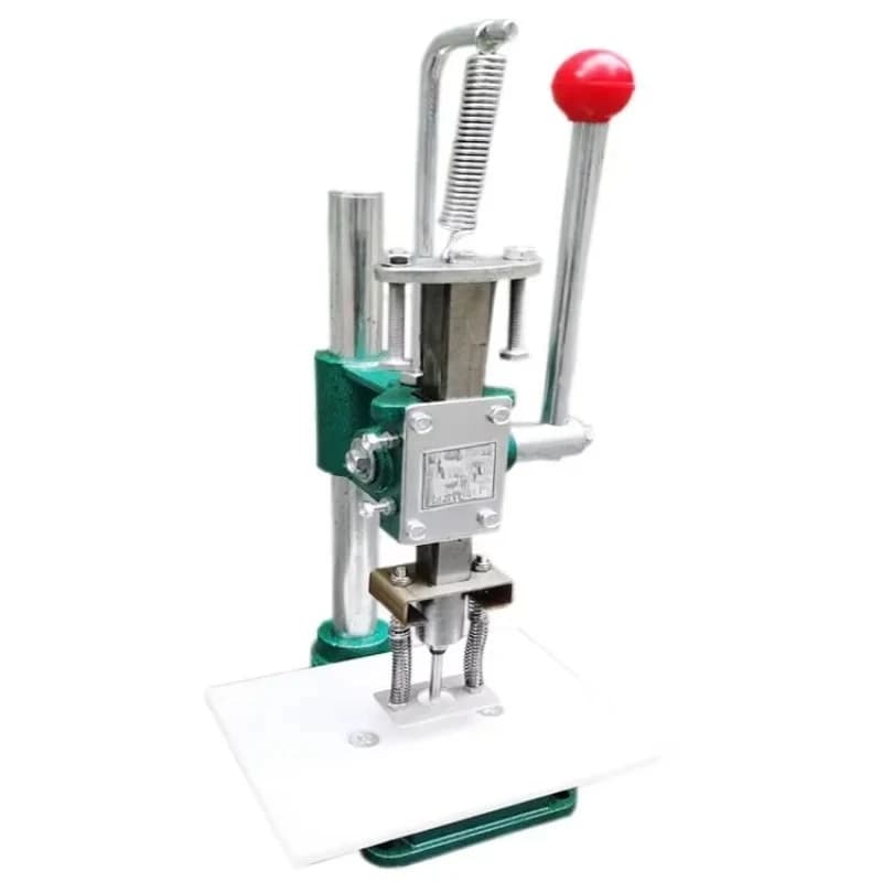 Manual table punching machine for plastic bags with paper drill