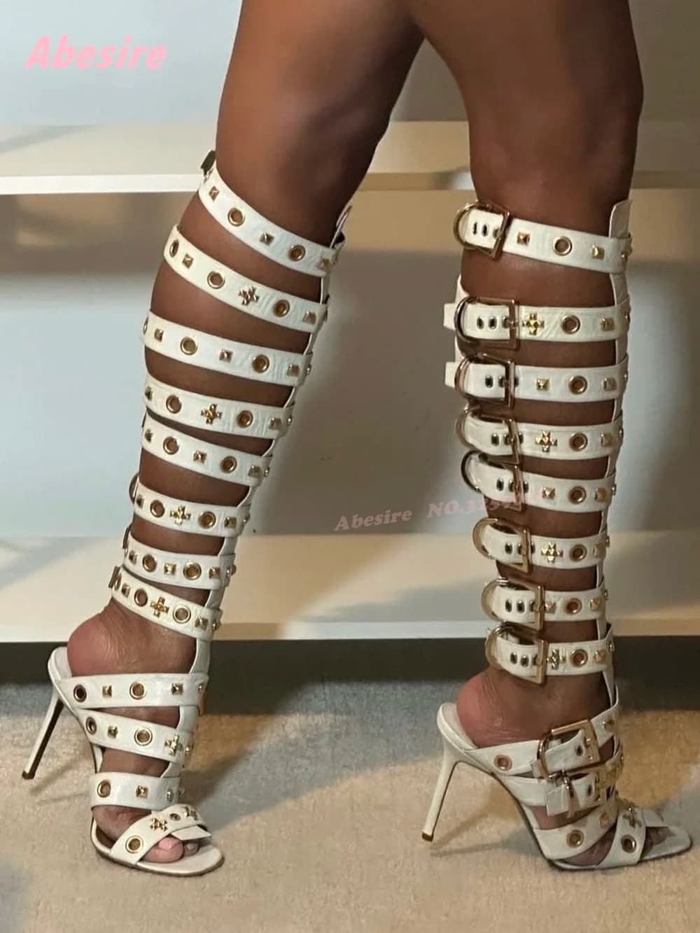 Sandals gladiator with cut-out with white rivets Stiletto heels with open toe Stroller shoes with multi-buckle ankle strap Summer patchwork shoes