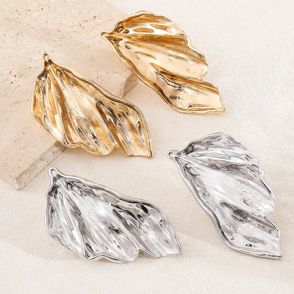 Punk irregular metallic feeling ginkgo leaf gold stud simple fashion temperament senior earrings