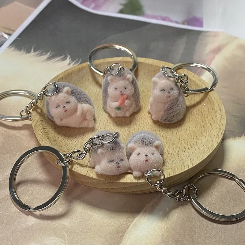 Carino soffice riccio addormentato portachiavi animali resina creativo divertente bello 3D floccaggio pet ciondolo borsa scatola portachiavi auto gioielli