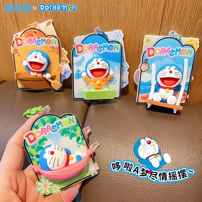 Doraemon Rotating Swing Stress-Relief Backpack Pendant Keychain 2026 New Cartoon Dingdang Cat Couple Small Pendant Car Key Chain
