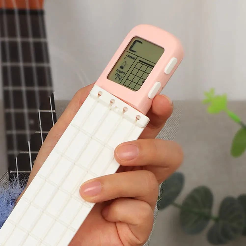 Strumento per Praticare le Accordi dell'Ukulele, Portatile e Leggero in ABS, Esercitatore per Dita, Accessorio per l'Apprendimento dell'Ukulele