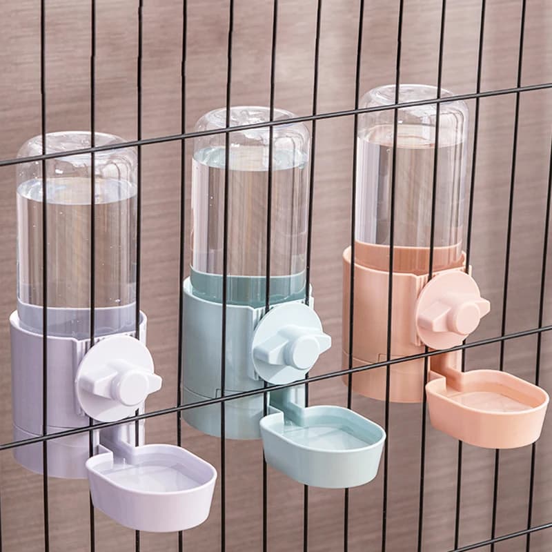 Gabbia per alimentazione automatica per animali domestici Ciotola sospesa Bottiglia d'acqua Contenitore per alimenti Cucciolo di gatto Coniglio Alimentatore per animali domestici per uccelli Prodotto