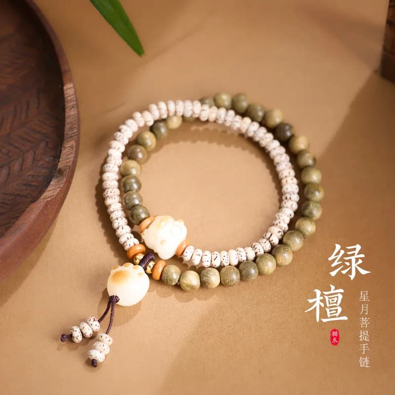 Bracciale doppio cerchio con zampa di gatto bruciata al carbone Bodhi con stella lunare in legno di sandalo verde naturale da 6 mm