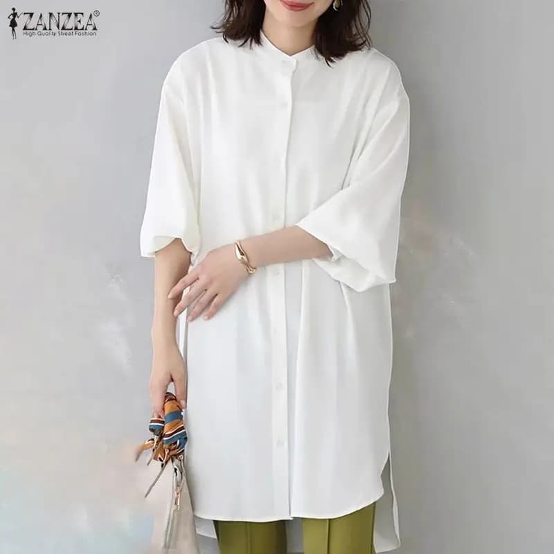 2026 ZANZEA Camicie lunghe da donna Autunno Camicetta a maniche lunghe Bottoni moda Top asimmetrici Casual Allentato Solido Elegante Ufficio Blusas