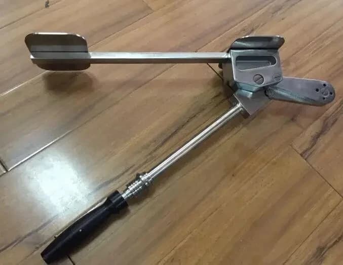 Bench-top rod-breaking pliers, rod-breaking devices, scissors, and basic tools for the spine