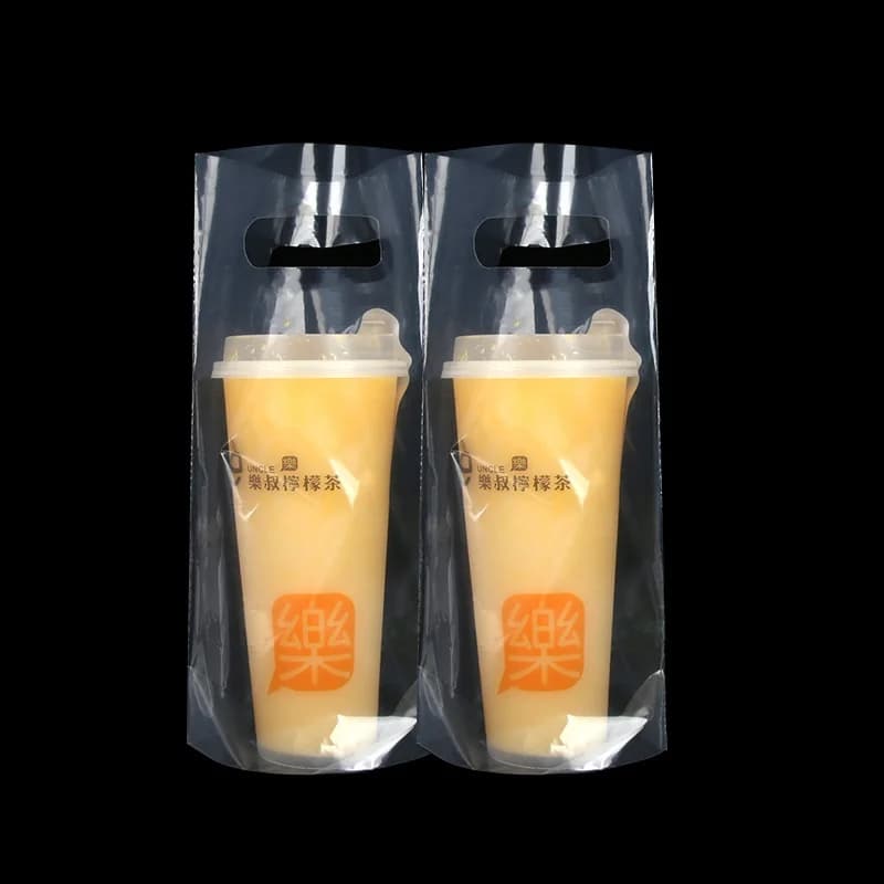 1000 pezzi di plastica trasparente spessa portabevande asporto borsa due design bere cola tazza imballaggio manico borsa per una tazza pacchetto borse