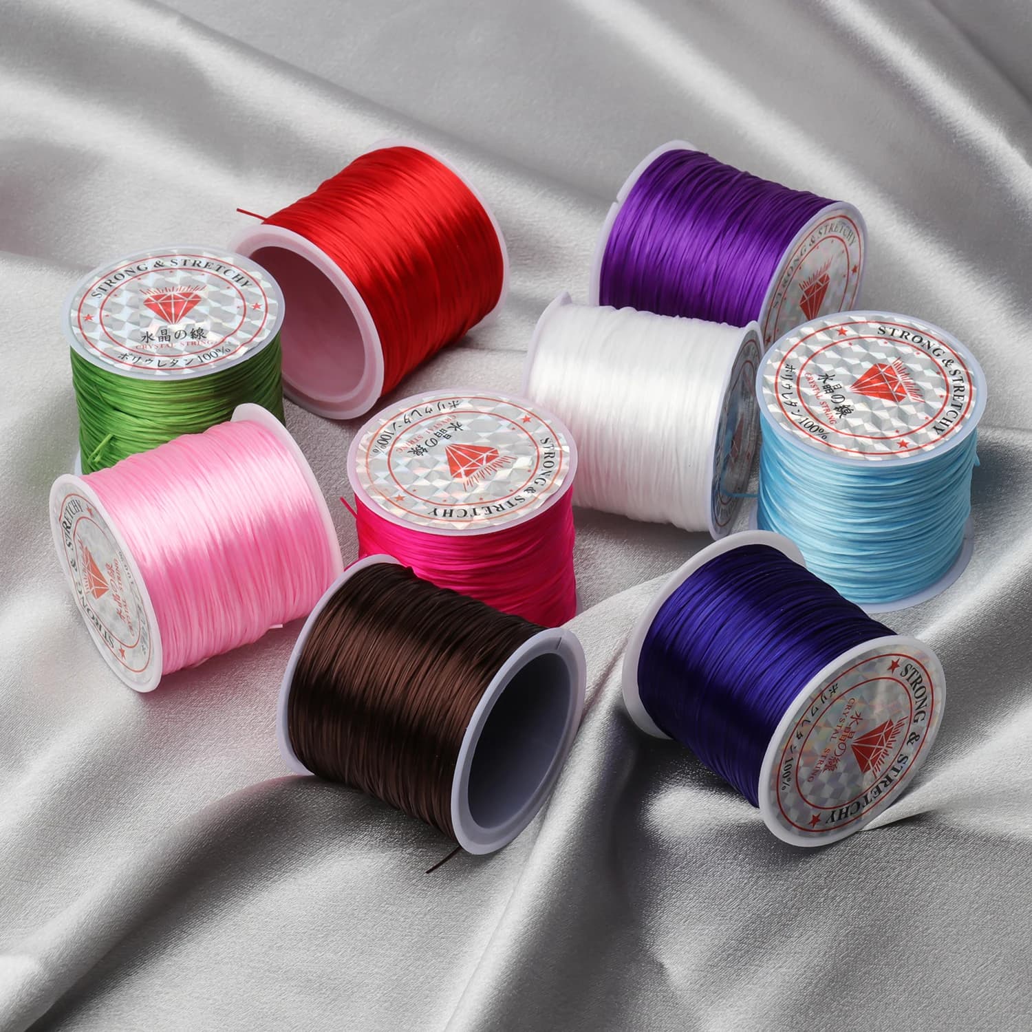 vendita all'ingrosso 60 metri/rotolo 0,6 mm di larghezza corda elastica elasticizzata perline filo/cavo/stringa/filo per materiali per la creazione di gioielli con ciondoli fai da te
