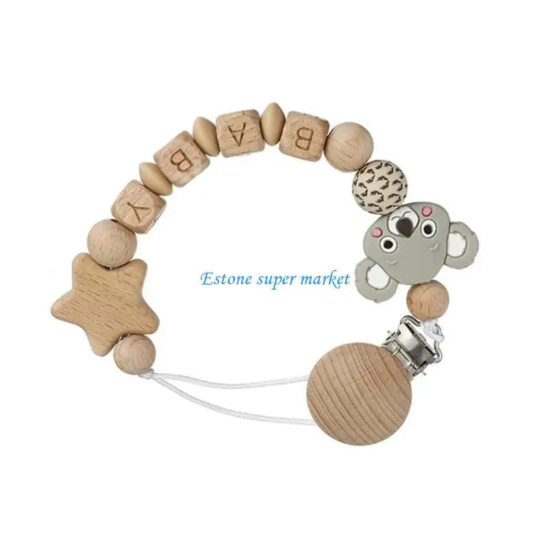 090B Catenella per dentizione dei bambini in legno faggio e clip per ciuccio. Adatto ai viaggi