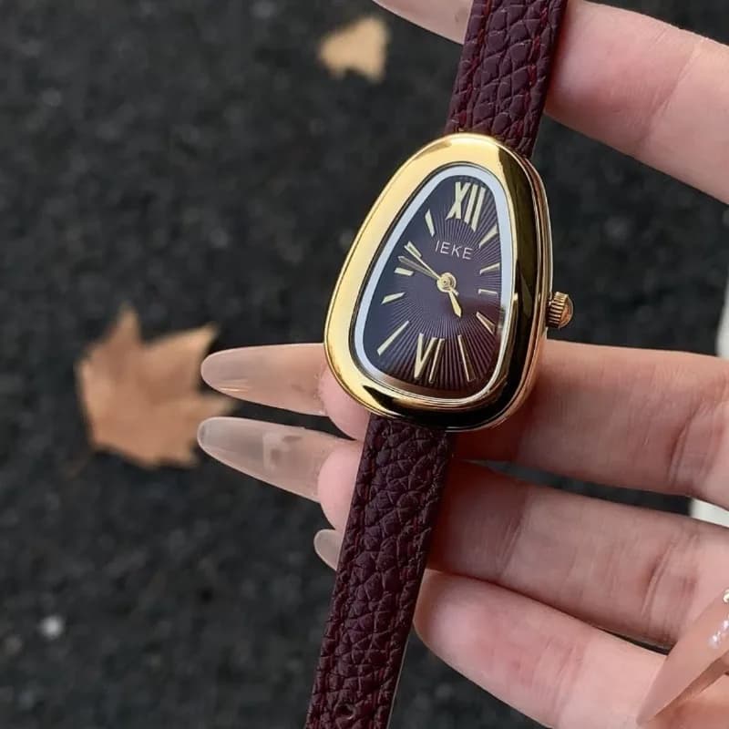 Orologio da donna al quarzo LEKE Ankola rosso vintage alla moda con testa di serpente, versatile e di nicchia