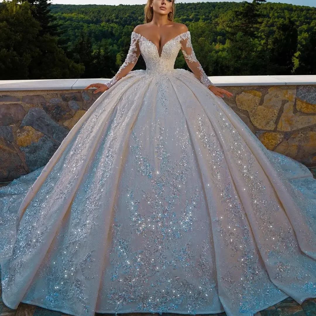 Abiti da sposa principessa con cristalli di lusso 2025 Abito da sposa con spalle scoperte a maniche lunghe con perline lucide e paillettes in pizzo