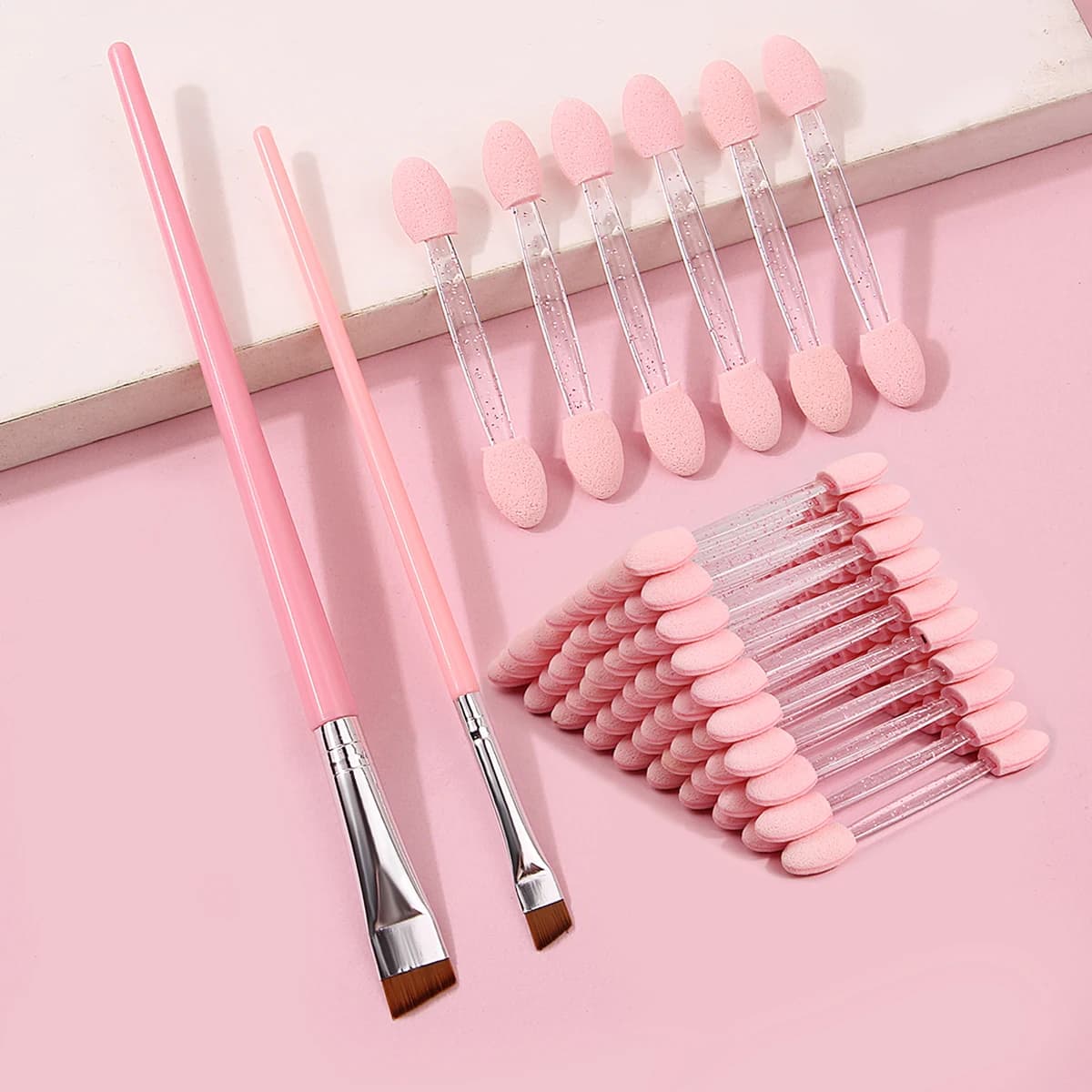 2 brushes for pink angled eyeliners + 50 sticks for double head sponge shading, accurately delineates the eyeliner/shade to fade