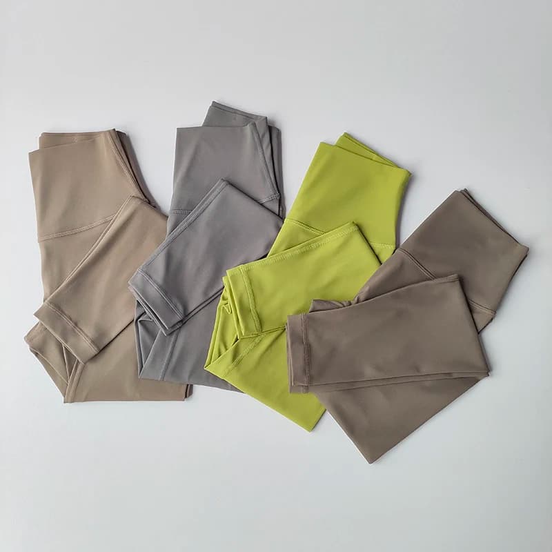 Pantaloni da yoga nudi sportivi tascabili Leggings attillati attillati a vita alta da donna Pantaloni da corsa e fitness ad asciugatura rapida