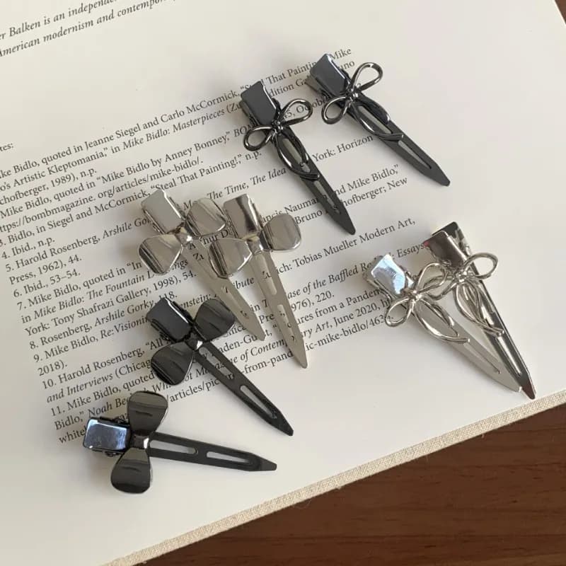 Korean simple metal bow bangs clip women's sweet cool hair accessories 2025 new side seamless clip duck bill clip