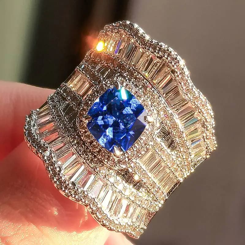 Huitan Anello color argento di lusso per le donne Festa di fidanzamento nuziale Accessori eleganti intarsiati Bianco/Blu CZ Gioielli chic alla moda