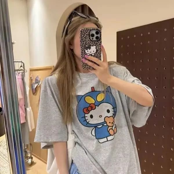 T-shirt stampata Hello Kitty a maniche corte Sanrio, nuova maglietta estiva da donna dal design ampio e versatile, top in puro cotone, divertente moda street