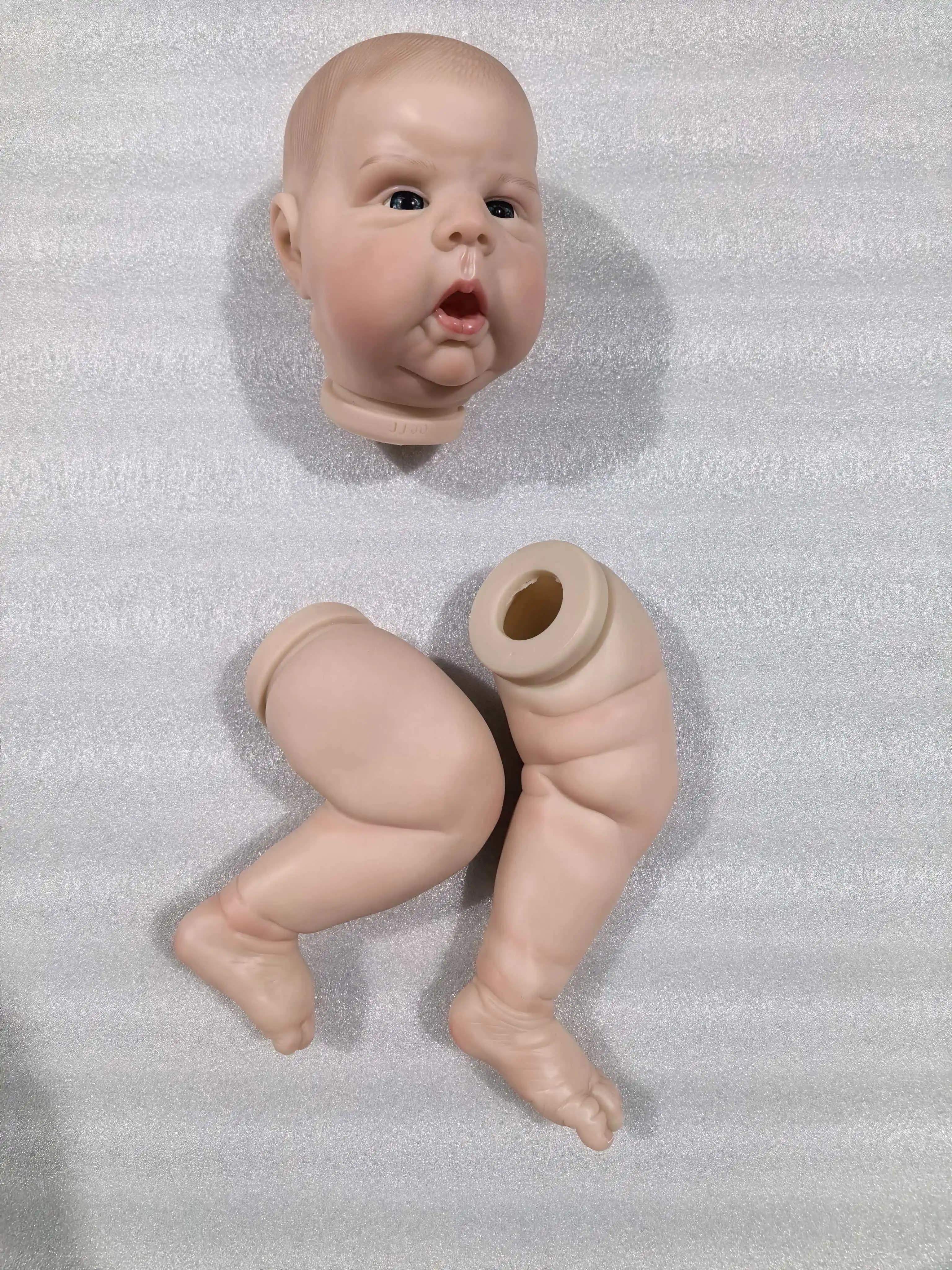 Kit per bambole Reborn NPK Gounchi da 22 pollici, corpo in tessuto con pelle bianca e capelli dipinti, kit per la creazione di bambole da collezione per appassionati