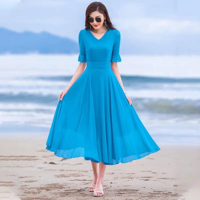 Abito rosso femminile 2025Donne Estate Nuovo piccolo lungo pendolo in chiffon Abiti da donna Super Fairy Temperamento Abito da spiaggia femminile