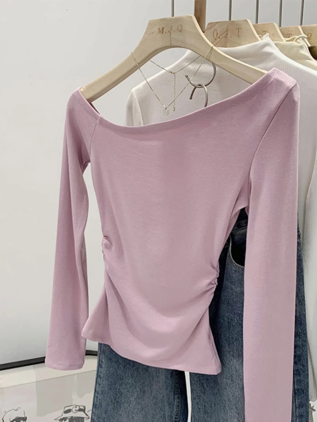T-shirt sexy a maniche lunghe slim fit da donna, nuovo stile primavera estate, con linea spalla irregolare e design a vita interna, confortevole cotone