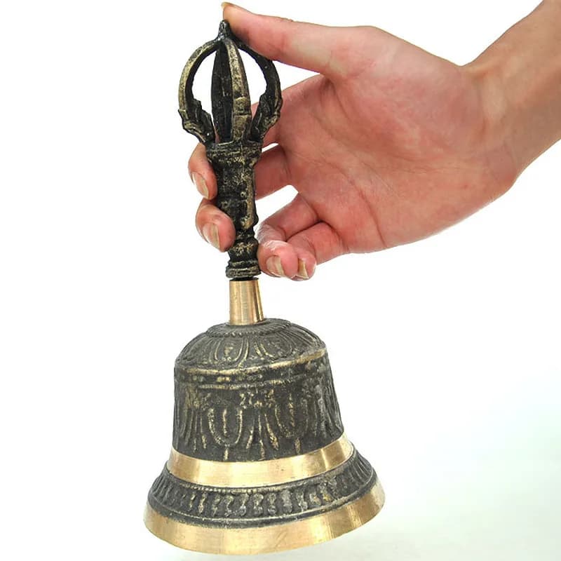 Tibetan Buddhist temple ritual instruments: hand-held , vajras for ceremonies, brass bells
