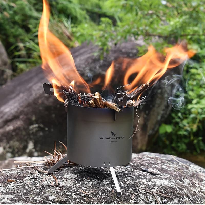 Boundless Voyage Camping bruciatori stufa a legna in titanio con supporti per pentole rimovibili gambe pieghevoli forno per pentole da trekking all'aperto